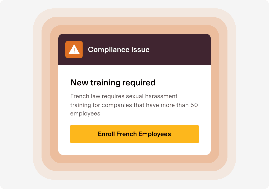 Compliance issue alert card stating new training is required by French law, with a yellow Enroll French Employees button.