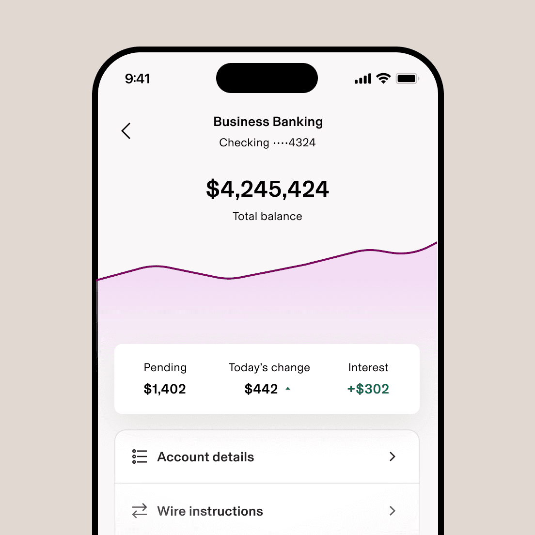 A smartphone displaying a business banking app showing a checking account balance with a purple trend chart.