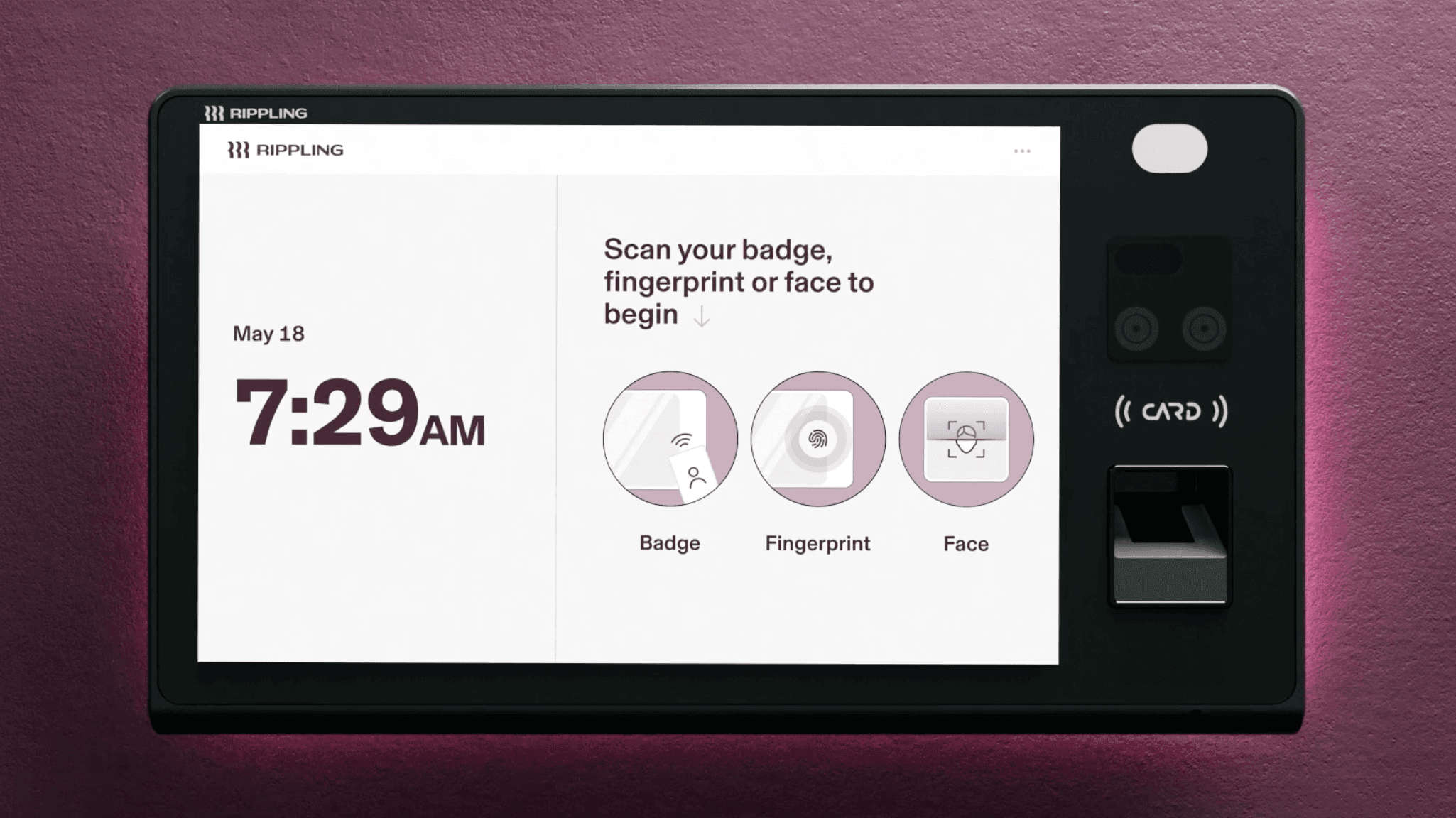 Photograph of a device that looks like a tablet mounted on a wall with a screen showing the Rippling logo, the time, and a message that says "Scan your badge, fingerprint or face to begin"